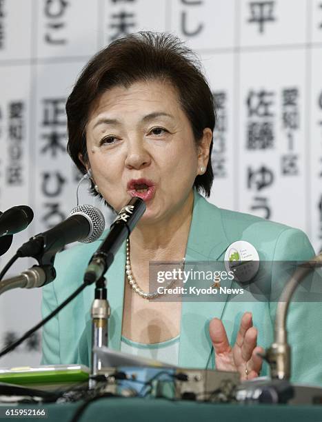 Japan - Shiga Gov. Yukiko Kada, head of the antinuclear Tomorrow Party of Japan, answers a question during a television interview in Tokyo on Dec....