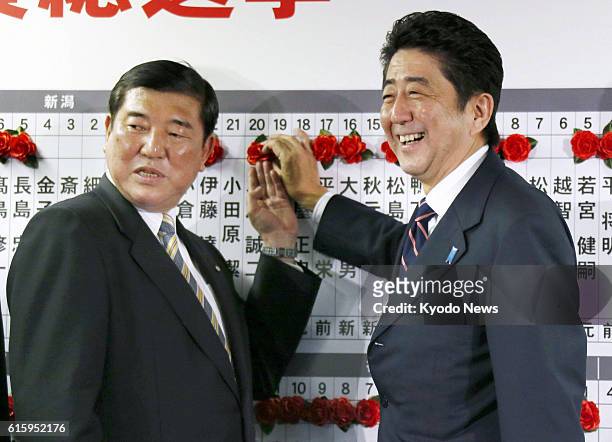 Japan - Former Prime Minister Shinzo Abe , head of Japan's main opposition Liberal Democratic Party, and Shigeru Ishiba, the party's secretary...
