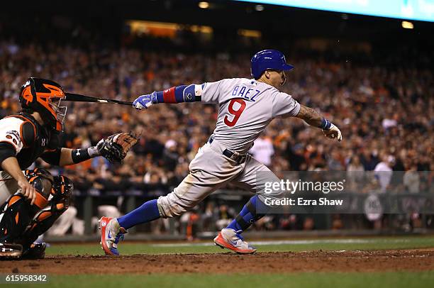 Javier Baez of the Chicago Cubs bats against the San Francisco Giants during Game Four of the National League Division Series at AT&T Park on October...