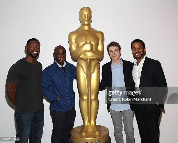 Trevante Rhodes, Barry Jenkins, Nicholas Britell and Andre Holland attend The Academy of Motion Picture Arts and Sciences hosts an Official Academy...