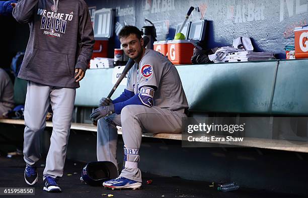 Kris Bryant of the Chicago Cubs sits in the dugout before their gainst the San Francisco Giants in Game Four of the National League Division Series...