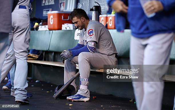 Kris Bryant of the Chicago Cubs sits in the dugout before their gainst the San Francisco Giants in Game Four of the National League Division Series...