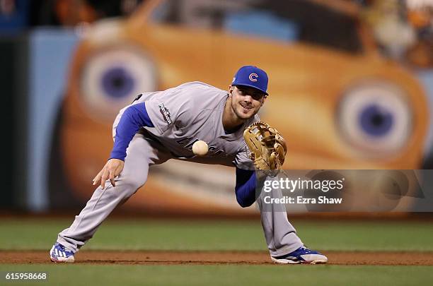 Kris Bryant of the Chicago Cubs fields a ground ball during their game against the San Francisco Giants in Game Four of the National League Division...