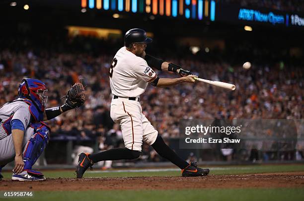 Hunter Pence of the San Francisco Giants bats against the Chicago Cubs during Game Four of the National League Division Series at AT&T Park on...