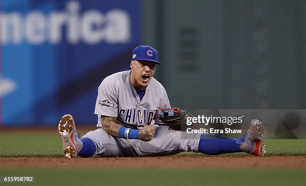 Javier Baez of the Chicago Cubs reacts during their game against the San Francisco Giants in Game Four of the National League Division Series at AT&T...