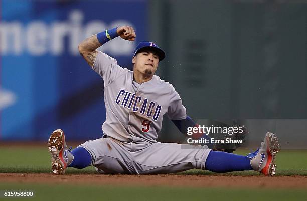 Javier Baez of the Chicago Cubs reacts during their game against the San Francisco Giants in Game Four of the National League Division Series at AT&T...