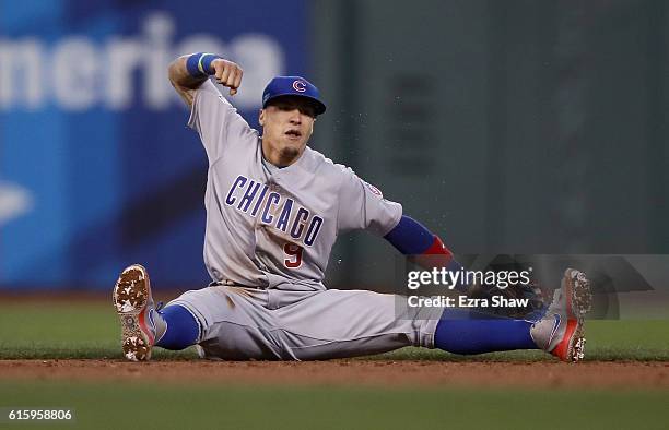 Javier Baez of the Chicago Cubs reacts during their game against the San Francisco Giants in Game Four of the National League Division Series at AT&T...