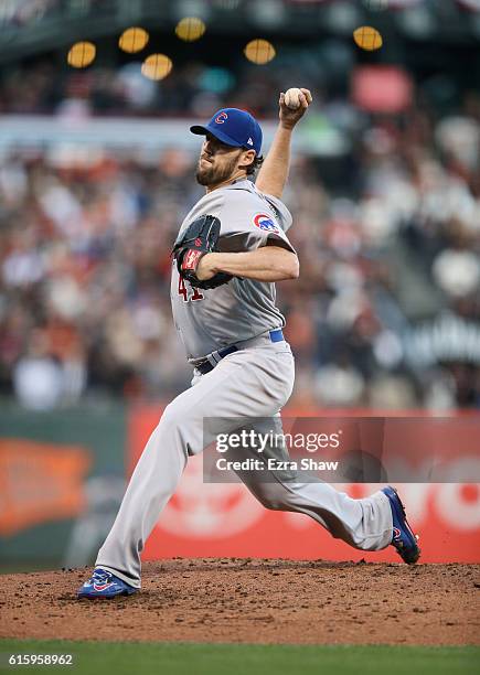 John Lackey of the Chicago Cubs pitches against the San Francisco Giants during Game Four of the National League Division Series at AT&T Park on...