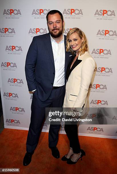 Actror Michael Gladis and actress Beth Behrs arrive at the ASPCA Benefit at Private Residence on October 20, 2016 in Los Angeles, California.