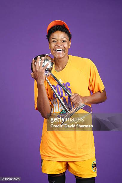 Alana Beard of the Los Angeles Sparks poses with the WNBA trophy after defeating the Minnesota Lynx in Game Five of the 2016 WNBA Finals on October...