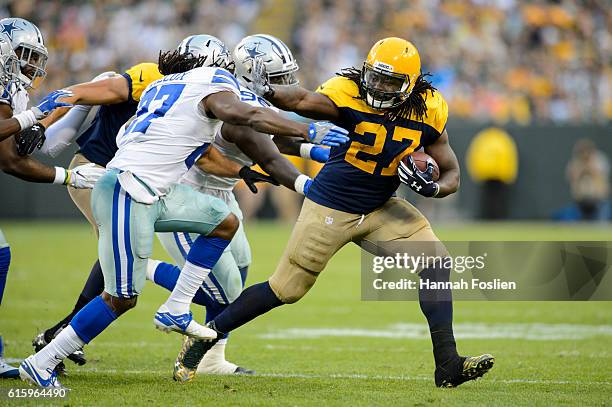 Eddie Lacy of the Green Bay Packers carries the ball against =Eddie Lacy and Maliek Collins of the Dallas Cowboys Dallas Cowboys during the game on...