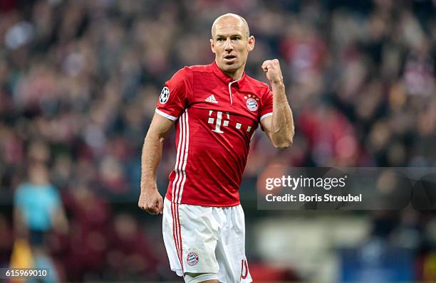 Arjen Robben of FC Bayern Muenchen celebrates after Robert Lewandowski of FC Bayern Muenchen scores his team's third goal during the UEFA Champions...