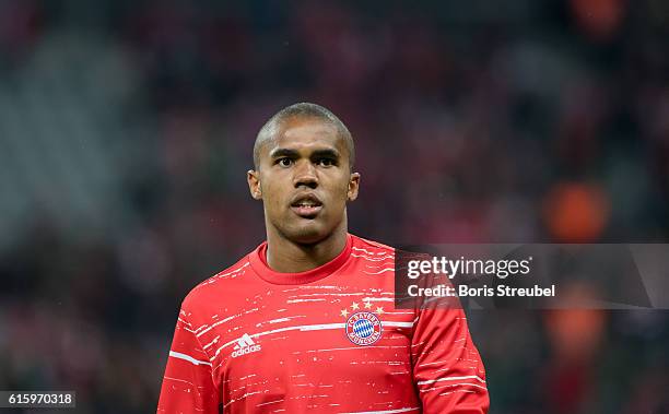 Douglas Costa of FC Bayern Muenchen looks on prior to the UEFA Champions League group D match between FC Bayern Muenchen and PSV Eindhoven at Allianz...