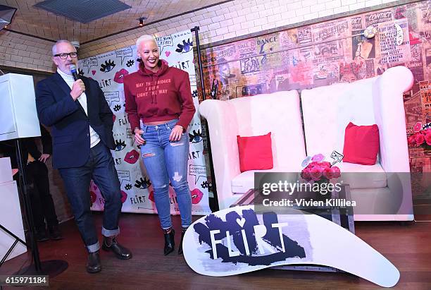 Creative director of Flirt Cosmetics Donald Robertson and Amber Rose attend Flirt Cosmetics x Amber Rose Event on October 20, 2016 in Los Angeles,...