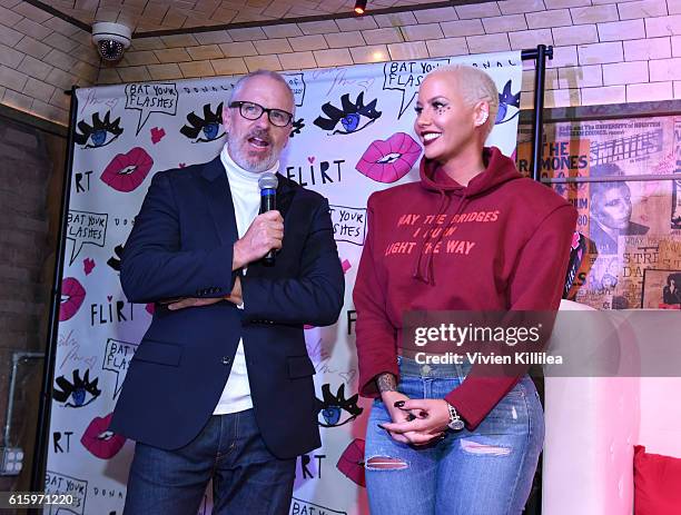 Creative director of Flirt Cosmetics Donald Robertson and Amber Rose attend Flirt Cosmetics x Amber Rose Event on October 20, 2016 in Los Angeles,...