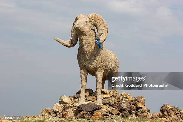 mongolia: hilltop statue at khanbogd ger camp - argali stock pictures, royalty-free photos & images