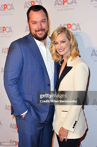 Actress Beth Behrs and actor Michael Gladis attend ASPCA Benefit event at Private Residence on October 20, 2016 in Los Angeles, California.