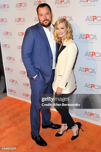 Actress Beth Behrs and actor Michael Gladis attend ASPCA Benefit event at Private Residence on October 20, 2016 in Los Angeles, California.
