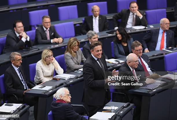 Konstantin von Notz of the German Greens Party speaks during debates at the Bundestag over a new law, later passed, that will expand the legal...