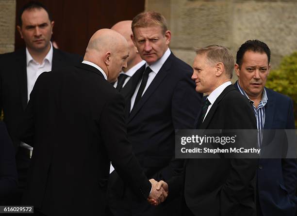 Clare , Ireland - 21 October 2016; Ireland head coach Joe Schmidt and former Munster and Ireland player Keith Wood arrive for the funeral of Munster...