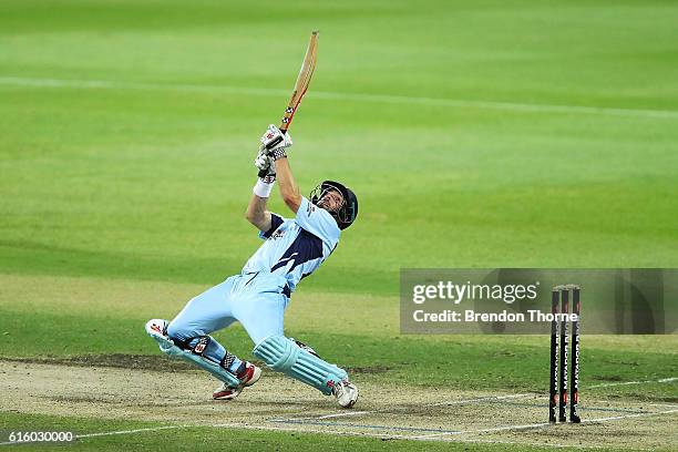 Ed Cowan of the Blues hits for six during the Matador BBQs One Day Cup match between New South Wales and Victoria at Drummoyne Oval on October 21,...