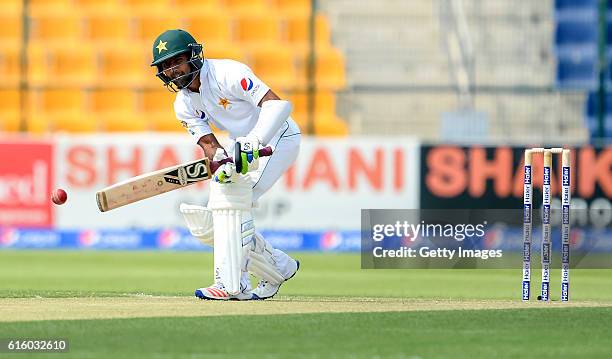 Asad Shafiq bats during Day One of the Second Test between Pakistan and the West Indies at the Zayed Cricket Stadium on October 21, 2016 in Abu...