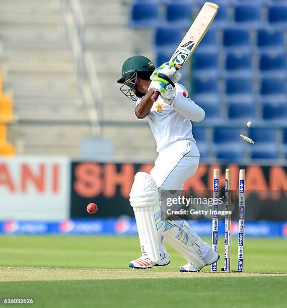 Asad Shafiq gets bowled by Shannon Gabriel during Day One of the Second Test between Pakistan and the West Indies at the Zayed Cricket Stadium on...