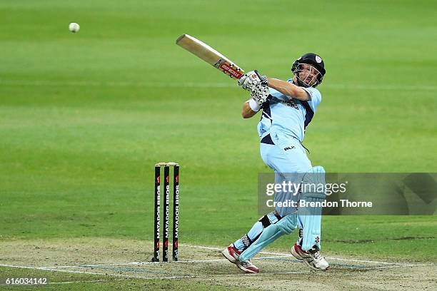 Ed Cowan of the Blues hits for six during the Matador BBQs One Day Cup match between New South Wales and Victoria at Drummoyne Oval on October 21,...