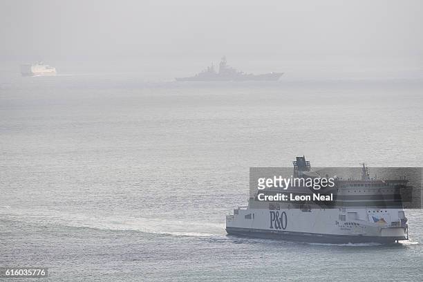 Russian Naval vessel passes between two car ferries in the English channel on October 21, 2016 near Dover, England. The Russian Navy's flotilla of...