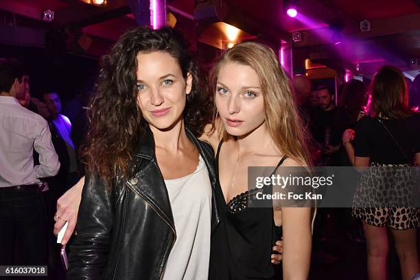 Actresses singers Cynthia Tolleron and Julie Fournier from 'Le Rouge et Le Noir' Rock Opera performing at the Palace Theater attend the Palace...