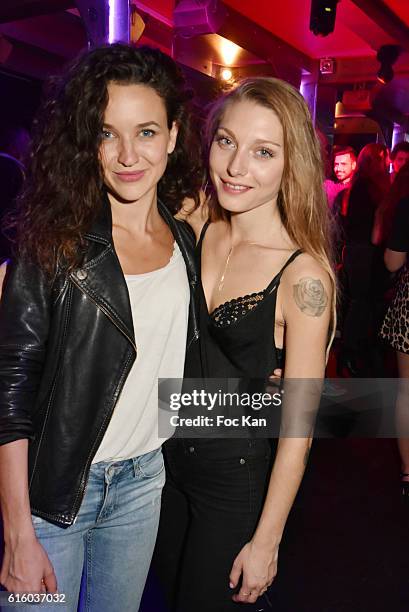 Actresses singers Cynthia Tolleron and Julie Fournier from 'Le Rouge et Le Noir' Rock Opera performing at the Palace Theater attend the Palace...