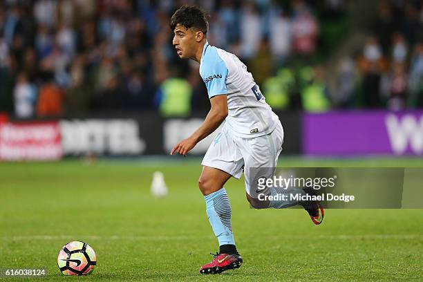Daniel Arzani of Melbourne City runs with the ball during the round three A-League match between Melbourne City FC and Perth Glory at AAMI Park on...
