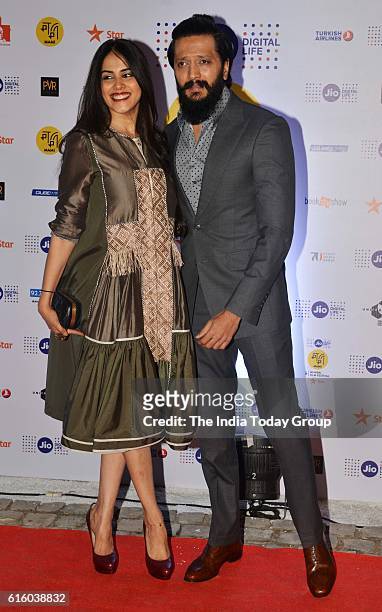 October 20: Riteish Deshmukh with his wife Genelia D'Souza during the opening ceremony of Jio MAMI 18th Mumbai Film Festival at the Royal Opera House...