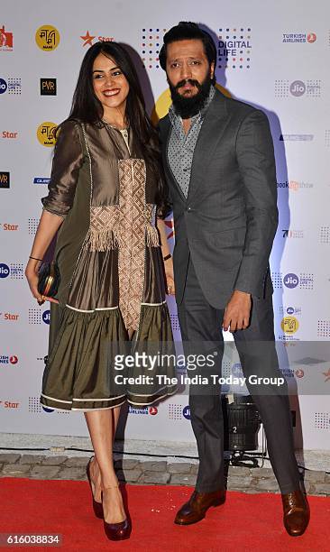 October 20: Riteish Deshmukh with his wife Genelia D'Souza during the opening ceremony of Jio MAMI 18th Mumbai Film Festival at the Royal Opera House...