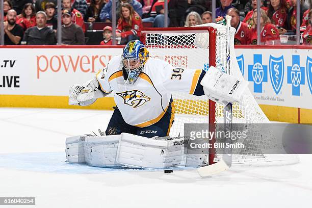 Goalie Marek Mazanec of the Nashville Predators blocks the puck against the Chicago Blackhawks in the first period at the United Center on October...