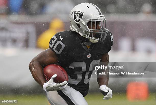 SaQwan Edwards of the Oakland Raiders returns a kickoff against the Kansas City Chiefs during their NFL football game at Oakland-Alameda County...