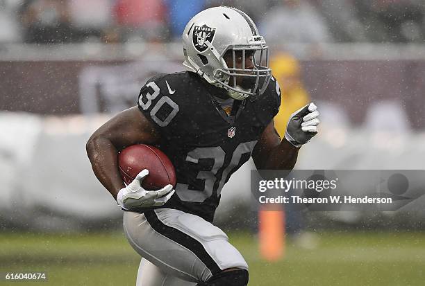 SaQwan Edwards of the Oakland Raiders returns a kickoff against the Kansas City Chiefs during their NFL football game at Oakland-Alameda County...