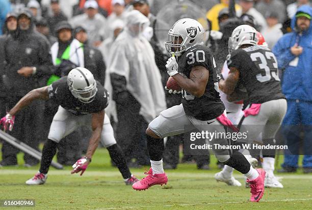 SaQwan Edwards of the Oakland Raiders returns a kickoff against the Kansas City Chiefs during an NFL football game at Oakland-Alameda County Coliseum...