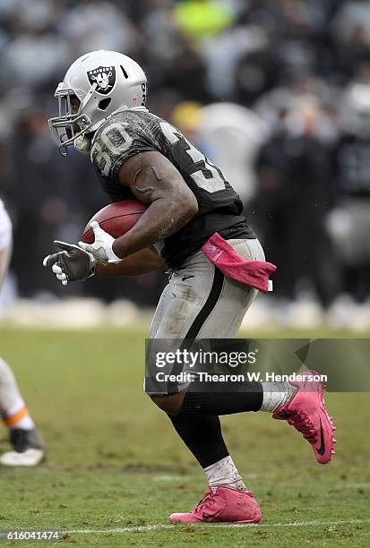 SaQwan Edwards of the Oakland Raiders returns a kickoff against the Kansas City Chiefs during an NFL football game at Oakland-Alameda County Coliseum...