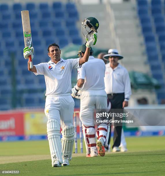 Younis Khan celebrates his century during Day One of the Second Test between Pakistan and the West Indies at the Zayed Cricket Stadium on October 21,...