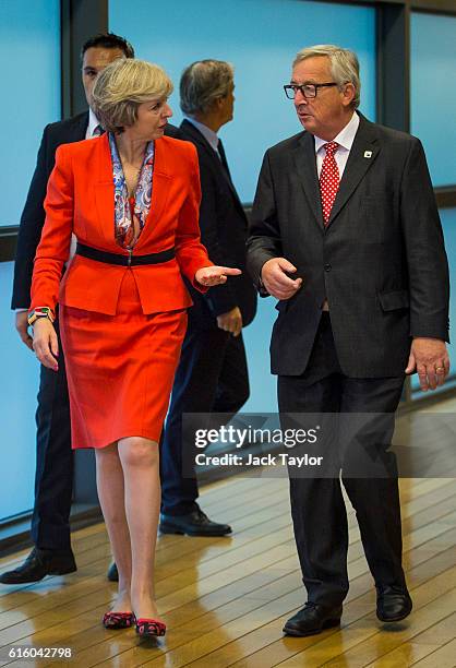 British Prime Minister Theresa May arrives with President of the European Commission Jean-Claude Juncker at the European Commission at the end of a...