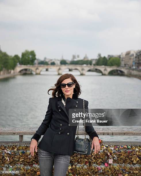 Actor Anna Mouglalis is photographed for Lufthansa Womans World magazine on June 2, 2014 in Paris, France.