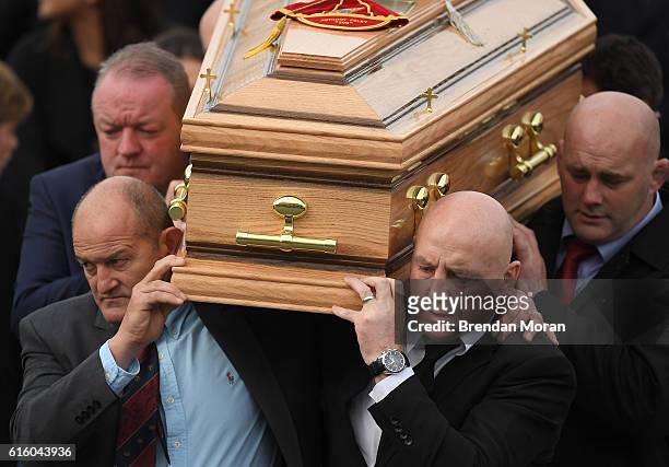 Clare , Ireland - 21 October 2016; Former Munster players, from left, Mick Galwey, Peter Clohessy Keith Wood and John Hayes carry the coffin of...
