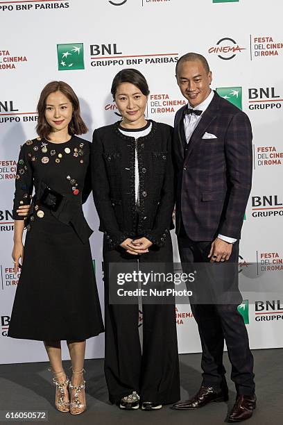 Peter Yun Tung Ho, Jiang Yiyan and Mandy Law , Film Producer, attend the photocall of movie 'Sword Master 3D ' during the 11th International Rome...