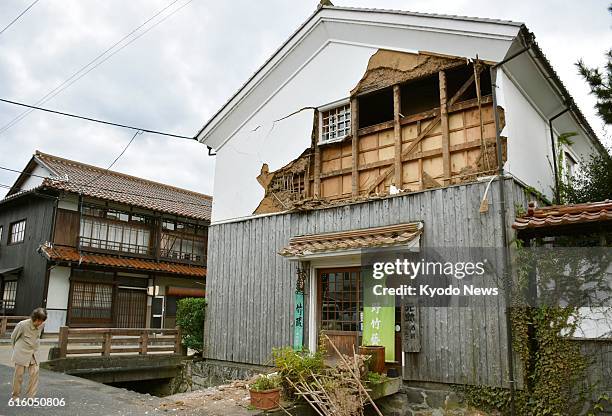 Plaster wall of a storehouse is damaged in Kurayoshi, Tottori Prefecture, in western Japan after an earthquake with a preliminary magnitude of 6.6...