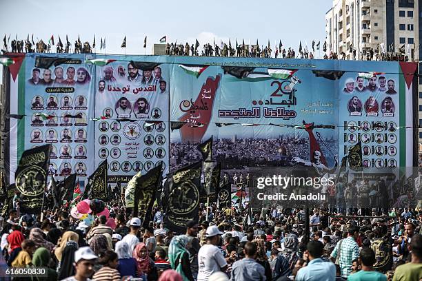 Members of Palestinian Islamic Jihad Movement attend a ceremony held to mark the 29th foundation anniversary of PIJ at the El Katibe Square in Gaza...