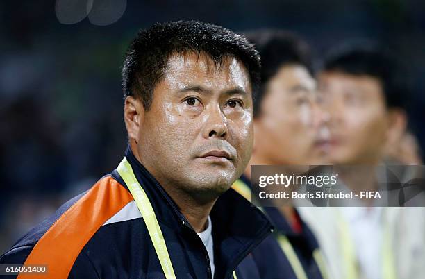 Head coach Jong Bok Sin of Korea DVR looks on prior to the FIFA U-17 Women's World Cup Finale match between Korea DPR and Japan at Amman...