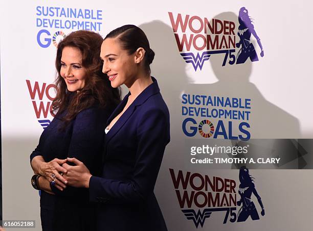 Actors Gal Gadot and Lynda Carter pose as the UN names the comic character Wonder Woman its Honorary Ambassador for the Empowerment of Women and...