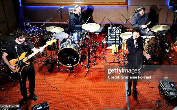 Channy Leaneagh, Chris Bierden, Drew Christopherson and Ben Ivascu of Polica perform at Low Four Studios on October 21, 2016 in Manchester, England.