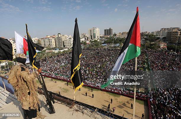 Members of Palestinian Islamic Jihad Movement attend a ceremony held to mark the 29th foundation anniversary of PIJ at the El Katibe Square in Gaza...